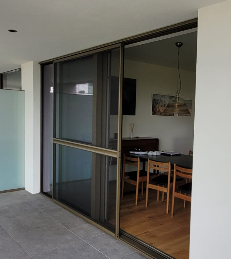 Sliding mosquito door